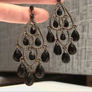Silver dangle earrings with black accents